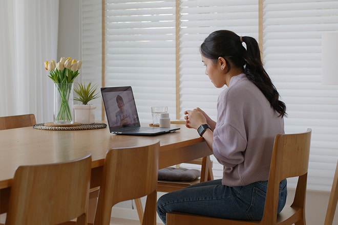 patient receiving telehealth addiction treatment from home