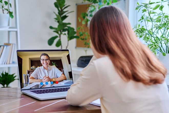 patient receiving personalized telehealth addiction treatment at home