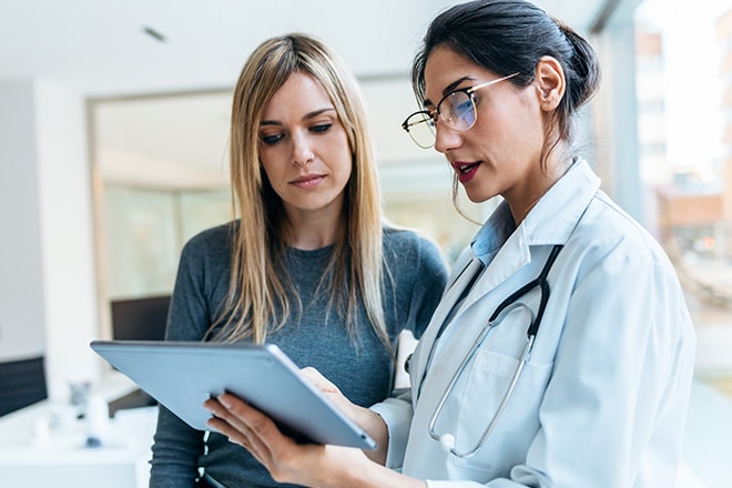 doctor and patient discussing methadone conversion treatment plan