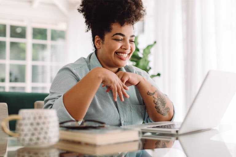 woman working on her laptop to become a Brightside Partner
